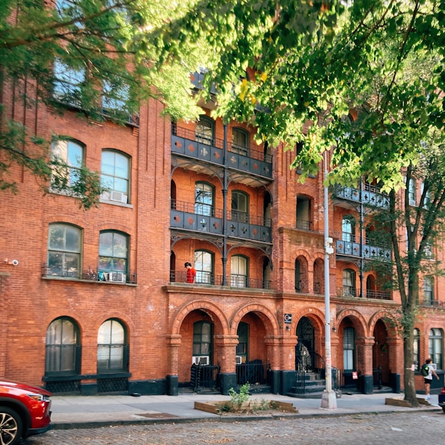 Historic brick apartment building in Brooklyn, typical of properties served by local cleaning services in Brooklyn. Image by Luca Kursawe via www.unsplash.com